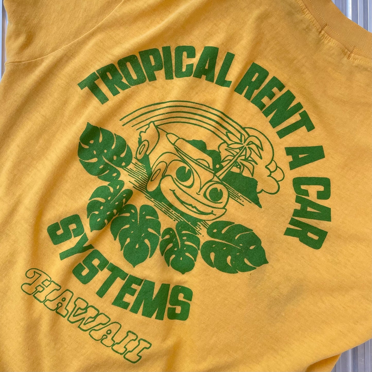 Tropical Rent A Car Pocket T-Shirt Yellow
